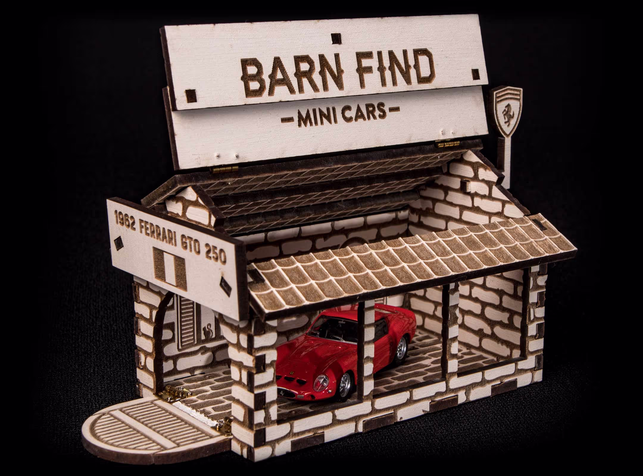 The Italian set variation of Barn Find Mini Cars, showcasing the miniature Ferrari car and the custom packaging we designed, portraying the scene of a old Italian countryside home.