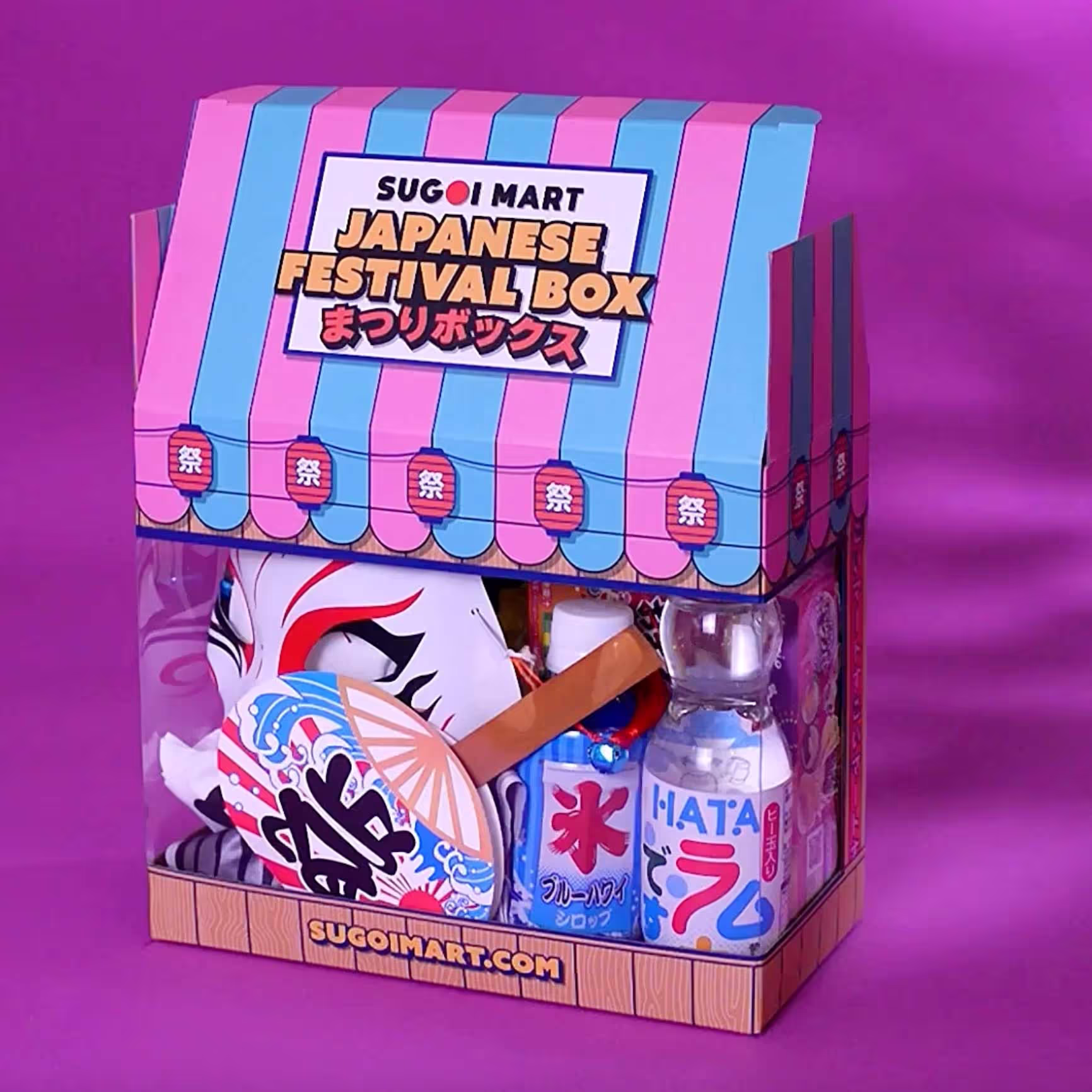 A vibrant package featuring art and illustration. The artwork portrays a Japanese Festival, this is called a "Matusuri" in Japanese.