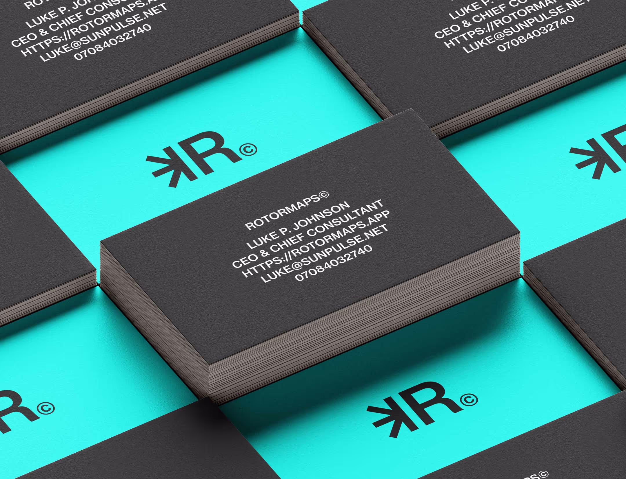 Rotormaps branded business cards laid out to show the design on both sides.