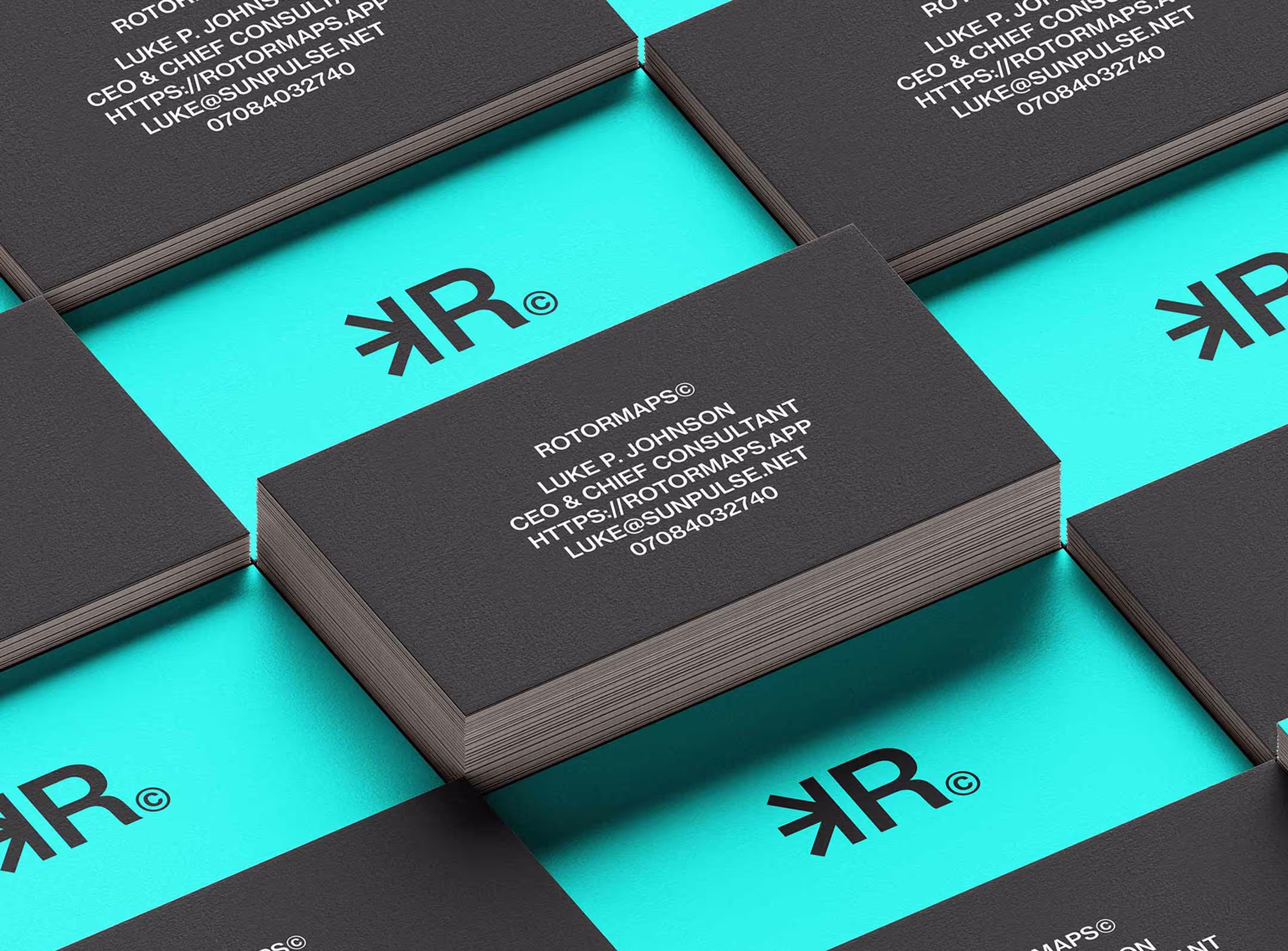 Rotormaps branded business cards laid out to show the design on both sides.
